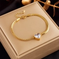 Elegant gold-plated chain bracelet featuring a sparkling heart-shaped cubic zirconia stone - White Heart Zirconia (B752 White)