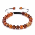 Close-up of brown carnelian beads with an adjustable black woven sliding knot cord - Banded Agate