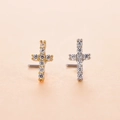 Macro view of gold and silver cross nose studs with micro-pave cubic zirconia crystals - Style 4# (Cross)