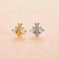 Macro detail of bee-shaped nose studs featuring gold and silver plating with zircon wings - Style 5# (Bee)