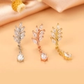 Detailed macro view of leaf-shaped ear studs in silver, rose gold, and gold finishes - Style 10