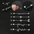 Industrial barbell set in stainless steel featuring snake and heart designs on a dark background - 3# Wrapped Snake Style / Silver