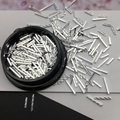 Silver textured rectangular metal nail art studs in a black round jar for manicure decor - 08# Threaded Metal Strip
