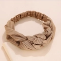 Knitted crossover wide headband in camel brown featuring a ribbed texture and twist knot - Khaki