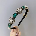 Baroque rhinestone headband featuring emerald green crystals and pearl flower clusters - Green