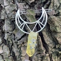 Detailed view of silver hollow moon hair clip with natural yellow crystal and star charm - Yellow Crystal