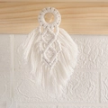 Detail of white cotton macrame feather wall hanging on a rustic wooden hook - Leaf Shape / Off-white