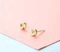 Minimalist gold twisted knot stud earrings for women with elegant woven design - Twist Knot