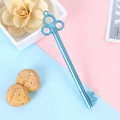 Blue vintage key-shaped gel pen with 0.5mm tip on a colorful pastel background - 0.5mm / Plum Blue