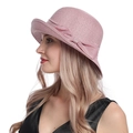 Detail of pink woven sun hat with bow decoration on a model side view - M / Pink