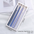 Set of four gradient blue tapered scented candles with minimalist white gift packaging - Combination Pack (CITTA) / Gradient Blue (Bluebell)