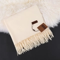 Elegant cream white cashmere-soft scarf with fringe tassels and premium brand tags - Off-white