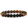 Close-up of natural lava rock and tiger eye stone beads on an elastic bracelet - Tiger Eye + Lava Stone
