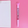 Pink cartoon pig gel pen with glitter liquid and 100% girl print on pink background - Side-eye Pig