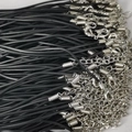 Close-up of bulk black wax cord necklace strings with silver lobster clasps and chains - Black Rubber Cord / 1.8mm / Black
