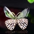 Green butterfly brooch with glitter wings and golden frame inlaid with white crystals - Green Transparent Rhinestone