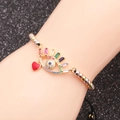 Bracciale regolabile con perline di rame e ciondoli a forma di occhio e cuore - Cuore Occhio del Diavolo