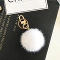 Portachiavi con pompon in pelliccia di visone bianco e finiture dorate di alta qualità - Bianco / 5cm