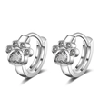 Detailed view of silver paw print hoop earrings with heart-shaped cubic zirconia stones - White Zirconia