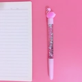 Pink flamingo quicksand pen with silver sequins on pink background with notebook - Pink Flamingo