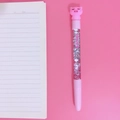 Pink cartoon gel pen with pig-shaped cap and floating glitter in transparent barrel - Eyelash Pig