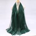 Detailed texture of lightweight dark green voile scarf on a beige mannequin bust - Dark Green