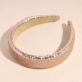 Close-up of sparkling rose gold sequin headband with soft beige inner lining - Rose Gold