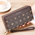 Detail of vintage brown floral long wallet with double zippers and leather wrist strap - Dark Brown Retro Monogram