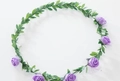 Floral wreath headpiece featuring six purple foam roses and green faux leaves - Purple