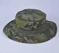 Close-up of tactical boonie hat with jungle camouflage pattern and breathable side vents - One Size / US Green Camo