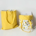 Lemon print and yellow canvas tote bag set with lemon label on a clean background - Yellow Lemon