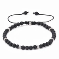 Detalle de pulsera ajustable de piedra volcánica con espaciadores de plata ornamentada - Piedra de Lava Negra (05)