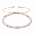 Pulsera tejida ajustable con cuentas de howlita blanca y espaciadores plateados - Howlita (11)