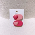 Set di due fermagli per capelli rosa opaco a forma di cuore su cartoncino bianco - D-059 Cuore Ovale (Coppia)