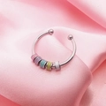 Rotating stainless steel anxiety ring with five colorful enamel beads on pink satin - Adjustable Open / Macaron Beads