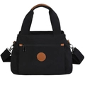 Large black canvas tote bag with brown leather trim and adjustable crossbody strap - Black