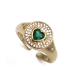 Detail of gold-plated adjustable ring featuring a heart-shaped green zircon stone - Heart Signet Style
