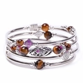 Bohemian multi-layer wrap bracelet featuring natural tiger eye beads and silver charms - Tiger Eye Style