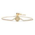Detail of adjustable gold bracelet featuring a clover charm set with sparkling cubic zirconia - Gold Clover