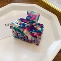 Detailed shot of rectangular resin hair clip with colorful oil painting ink textures - Small / Purple Floral