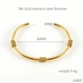 Detail of 18K gold stainless steel C-shape bracelet with 60mm diameter and 3mm thickness - Gold