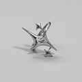 Detailed close-up of a silver star ring featuring a rectangular zircon in a prong setting - Silver Starburst Rectangular Zirconia