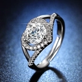 Silver adjustable six-prong ring with round diamond-cut stone on a blue background - Y103【1 Carat】