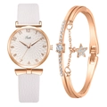 Detail of rose gold ladies watch with white dial and matching star bracelet set - Watch + Bracelet / White