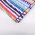 Dettaglio di carta velina colorata con strisce vivaci e motivi a pois - Colori dell'Arcobaleno / Set di 10 fogli