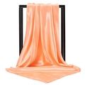 Elegant solid orange pink satin square scarf hanging on a minimalist frame with silk texture - Snow Bud