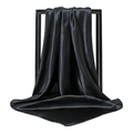 Elegant black satin square scarf with a silky glossy finish hanging on a minimal display - Black