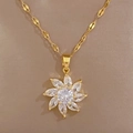 Close-up of titanium steel gold flower pendant necklace with micro-set sparkling crystals - Titanium Steel Chain Copper Pendant / Flower Pendant Necklace (F502)