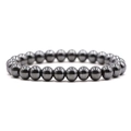 Polished hematite beaded bracelet with dark grey metallic sheen on elastic cord - Single Glossy Hematite Bracelet