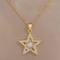 Macro detail of gold star pendant set with sparkling cubic zirconia on a delicate O-chain - Titanium Steel Chain + Copper Pendant / Star Necklace (D135)
